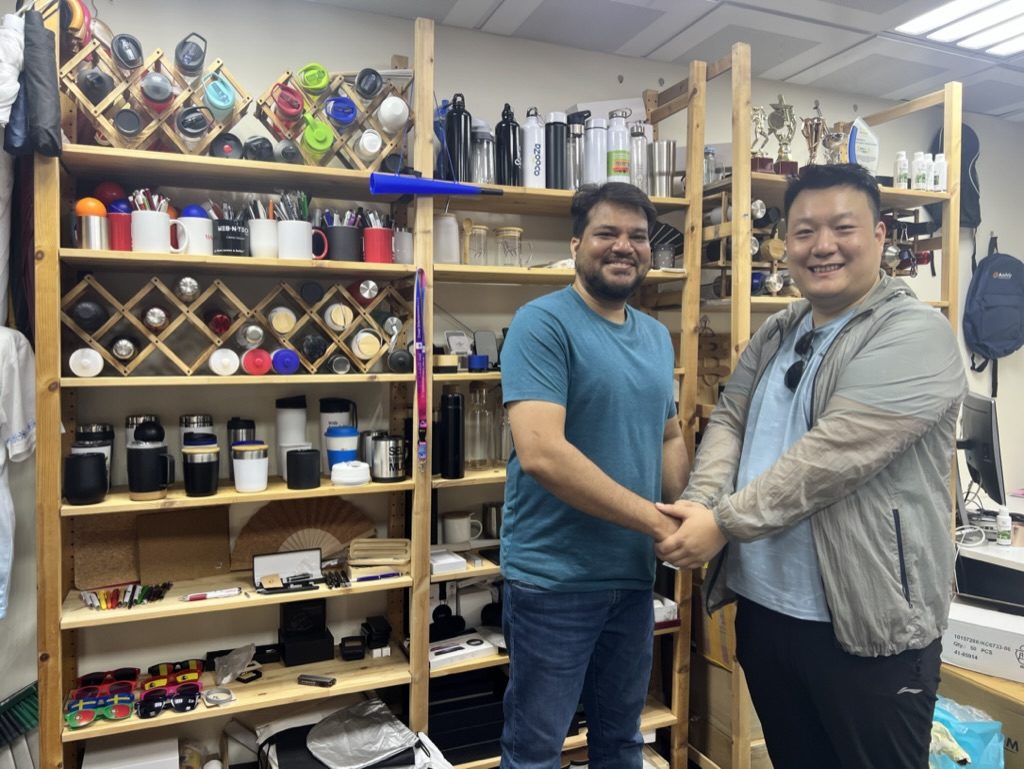 STWADD owner visiting a buyer in the buyer's office in Dubai, with product sample racks